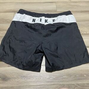 NWOT VTG 90s Nike Spell out Swoosh Shorts Swim Trunks Sewn Logo Lined mesh Black